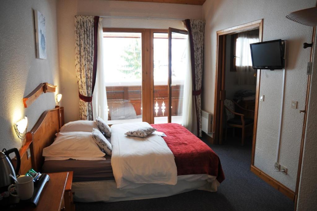 Le Calgary Hotel Les Saisies Szoba fotó